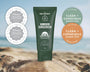 Green sunscreen tube with awards on a beach background. SPF30 Sunscreen from The Nude Alchemist Wins Best Kids Sunscreen and Best Children's Sunscreen